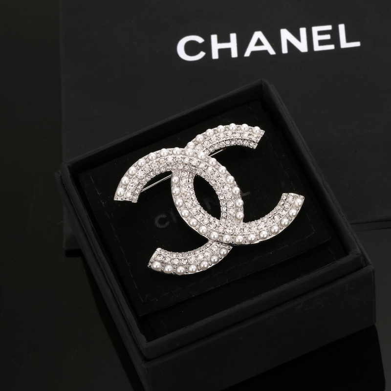 Ch**el brooches